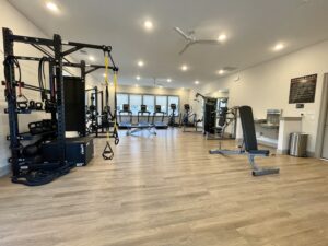 Interior photo of the fitness center at Marcella at Gateway Apartments in Bon Air, Virginia