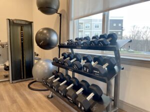 Interior photo of the fitness center at Marcella at Gateway Apartments in Bon Air, Virginia